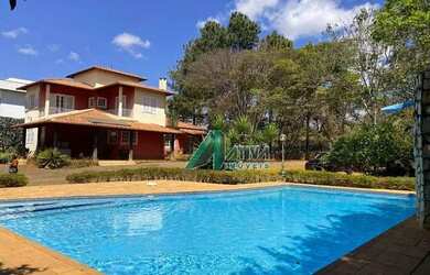 Imagem: A casa possui 4 Dormitórios, 4 Banheiros, 3 Vagas na garagem