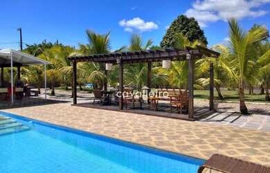 Imagem: A casa em condomínio possui 5 Dormitórios, 5 Banheiros, 5