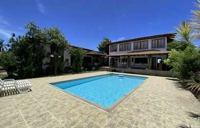 Imagem: A casa possui 5 Dormitórios, 5 Banheiros, 5 Vagas na garagem