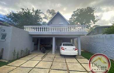 Imagem: A casa possui 4 Dormitórios, 3 Banheiros, 5 Vagas na garagem