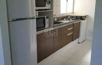 Imagem: O apartamento possui 2 Dormitórios, 1 Banheiro, 1 Vaga na garagem