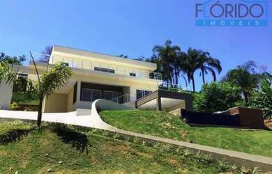 Imagem: A casa em condomínio possui 4 Dormitórios, 5 Banheiros, 3