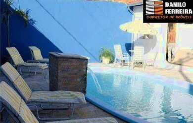 Imagem: A casa possui 2 Dormitórios, 4 Banheiros, 4 Vagas na garagem