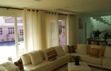 Imagem: A casa em condomínio possui 5 Dormitórios, 5 Banheiros, 4