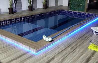 Imagem: A casa possui 4 Dormitórios, 5 Vagas na garagem e está localizado