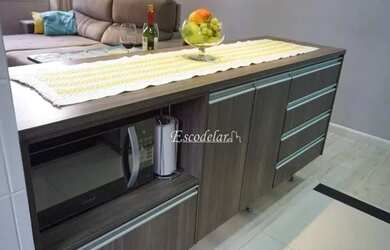 Imagem: O apartamento possui 2 Dormitórios, 1 Banheiro, 1 Vaga na garagem