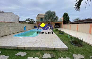 Imagem: A casa possui 4 Dormitórios, 3 Banheiros, 4 Vagas na garagem