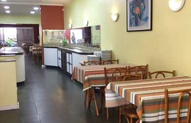 Imagem: A casa possui 3 Dormitórios, 3 Banheiros, 3 Vagas na garagem