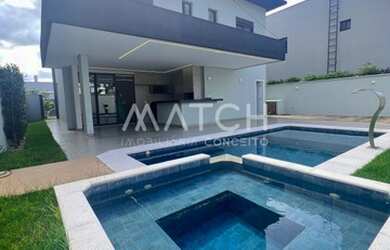 Imagem: A casa em condomínio possui 4 Dormitórios, 5 Banheiros, 2