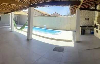 Imagem: A casa possui 4 Dormitórios, 4 Banheiros, 3 Vagas na garagem