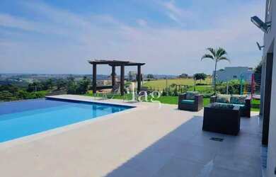 Imagem: A casa em condomínio possui 4 Dormitórios, 5 Banheiros, 5