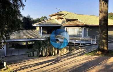 Imagem: A casa em condomínio possui 5 Dormitórios, 5 Banheiros, 5