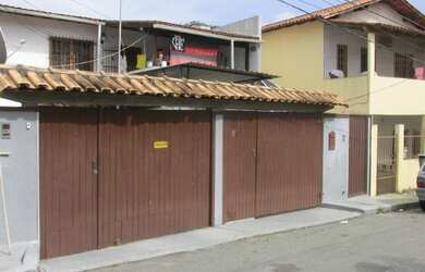 Imagem: A casa possui 2 Dormitórios, 1 Banheiro, 1 Vaga na garagem