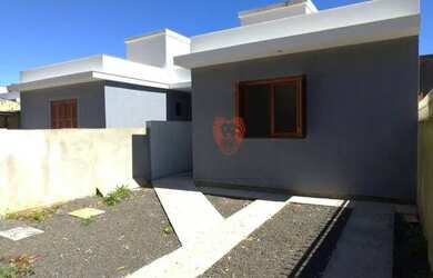 Imagem: A casa possui 2 Dormitórios, 1 Banheiro, 2 Vagas na garagem