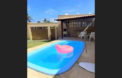 Imagem: A casa possui 4 Dormitórios e 3 Vagas na garagem e está localizado