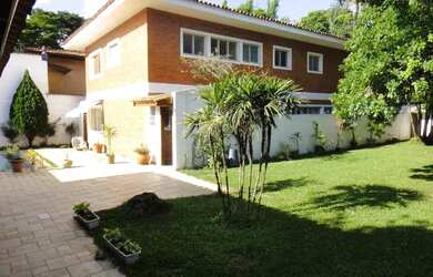 Imagem: A casa possui 5 Dormitórios, 4 Banheiros, 5 Vagas na garagem