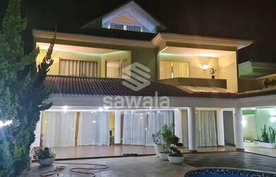 Imagem: A casa em condomínio possui 5 Dormitórios, 5 Banheiros, 4