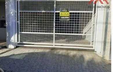 Imagem: A casa possui 3 Dormitórios, 4 Banheiros, 2 Vagas na garagem