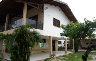 Imagem: A casa possui 5 Dormitórios, 5 Banheiros, 5 Vagas na garagem