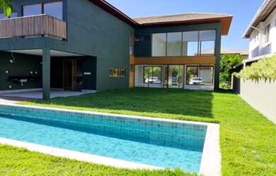 Imagem: A casa em condomínio possui 5 Dormitórios, 5 Banheiros, 4