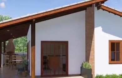 Imagem: A casa possui 2 Dormitórios, 1 Banheiro, 2 Vagas na garagem