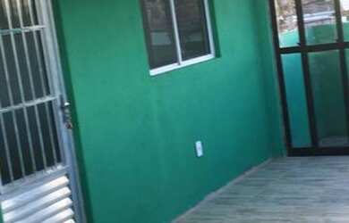 Imagem: A casa possui 2 Dormitórios, 1 Vaga na garagem e está localizado