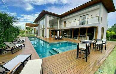 Imagem: A casa em condomínio possui 5 Dormitórios, 5 Banheiros, 4