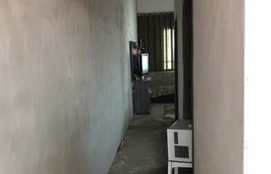 Imagem: A casa possui 2 Dormitórios, 1 Banheiro e está localizado