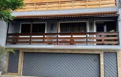 Imagem: A casa possui 3 Dormitórios, 1 Banheiro, 3 Vagas na garagem