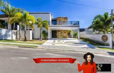 Imagem: A casa em condomínio possui 5 Dormitórios, 5 Banheiros, 5