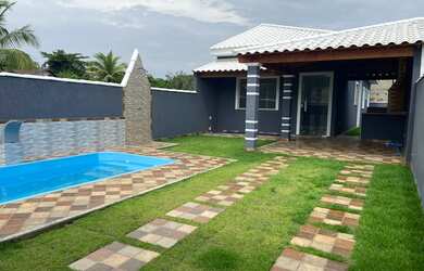 Imagem: A casa possui 2 Dormitórios, 1 Banheiro, 3 Vagas na garagem