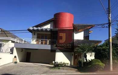 Imagem: A casa em condomínio possui 5 Dormitórios, 5 Banheiros, 4