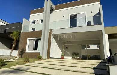 Imagem: A casa em condomínio possui 3 Dormitórios, 4 Banheiros, 4