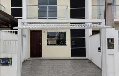 Imagem: A casa possui 2 Dormitórios, 3 Banheiros, 2 Vagas na garagem