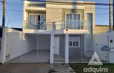 Imagem: A casa possui 3 Dormitórios, 3 Banheiros, 1 Vaga na garagem