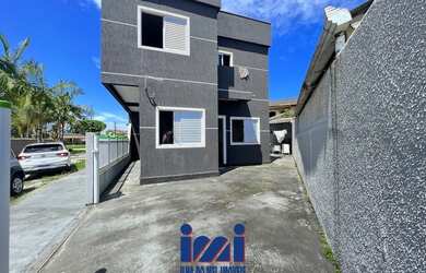 Imagem: A casa possui 3 Dormitórios, 2 Banheiros, 1 Vaga na garagem