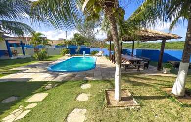 Imagem: A casa possui 5 Dormitórios, 5 Banheiros, 5 Vagas na garagem