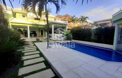 Imagem: A casa em condomínio possui 5 Dormitórios, 5 Banheiros, 2