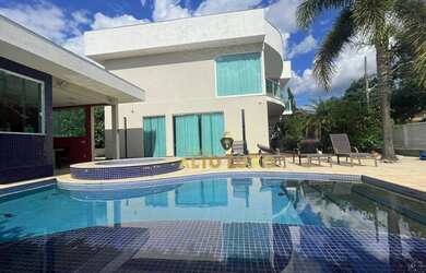 Imagem: A casa em condomínio possui 5 Dormitórios, 5 Banheiros, 5