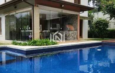 Imagem: A casa em condomínio possui 5 Dormitórios, 5 Banheiros, 3