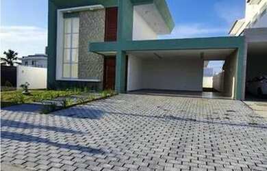 Imagem: A casa possui 3 Dormitórios, 3 Banheiros, 4 Vagas na garagem