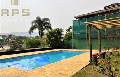 Imagem: A casa possui 3 Dormitórios, 5 Banheiros, 3 Vagas na garagem