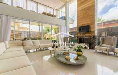 Imagem: A casa possui 5 Dormitórios, 5 Banheiros, 5 Vagas na garagem