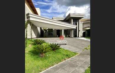 Imagem: A casa em condomínio possui 5 Dormitórios, 5 Banheiros, 5