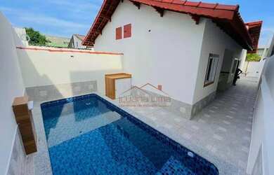 Imagem: A casa possui 2 Dormitórios, 1 Banheiro, 2 Vagas na garagem