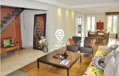 Imagem: A casa possui 4 Dormitórios, 4 Banheiros, 4 Vagas na garagem