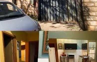 Imagem: A casa possui 3 Dormitórios, 2 Banheiros, 3 Vagas na garagem