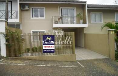 Imagem: A casa possui 2 Dormitórios, 2 Banheiros, 3 Vagas na garagem