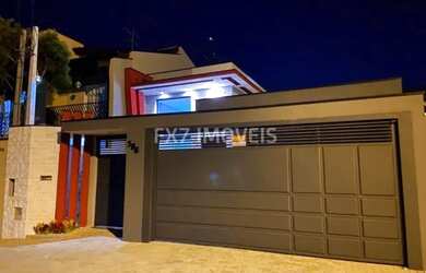 Imagem: A casa possui 3 Dormitórios, 3 Banheiros, 4 Vagas na garagem