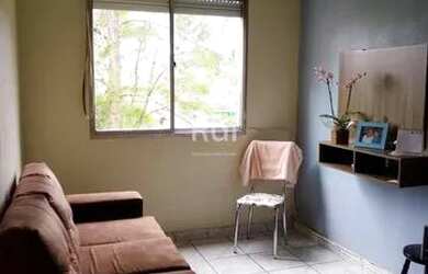 Imagem: O apartamento possui 1 Dormitório, 1 Banheiro, 1 Vaga na garagem